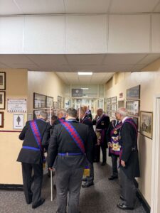 a provincial deputy dc starting to get the senior companions ready to process in to a meeting