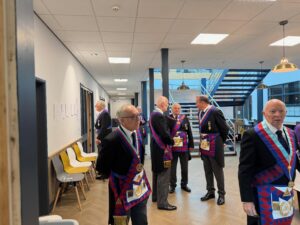 senior royal arch masons mixing before a meeting