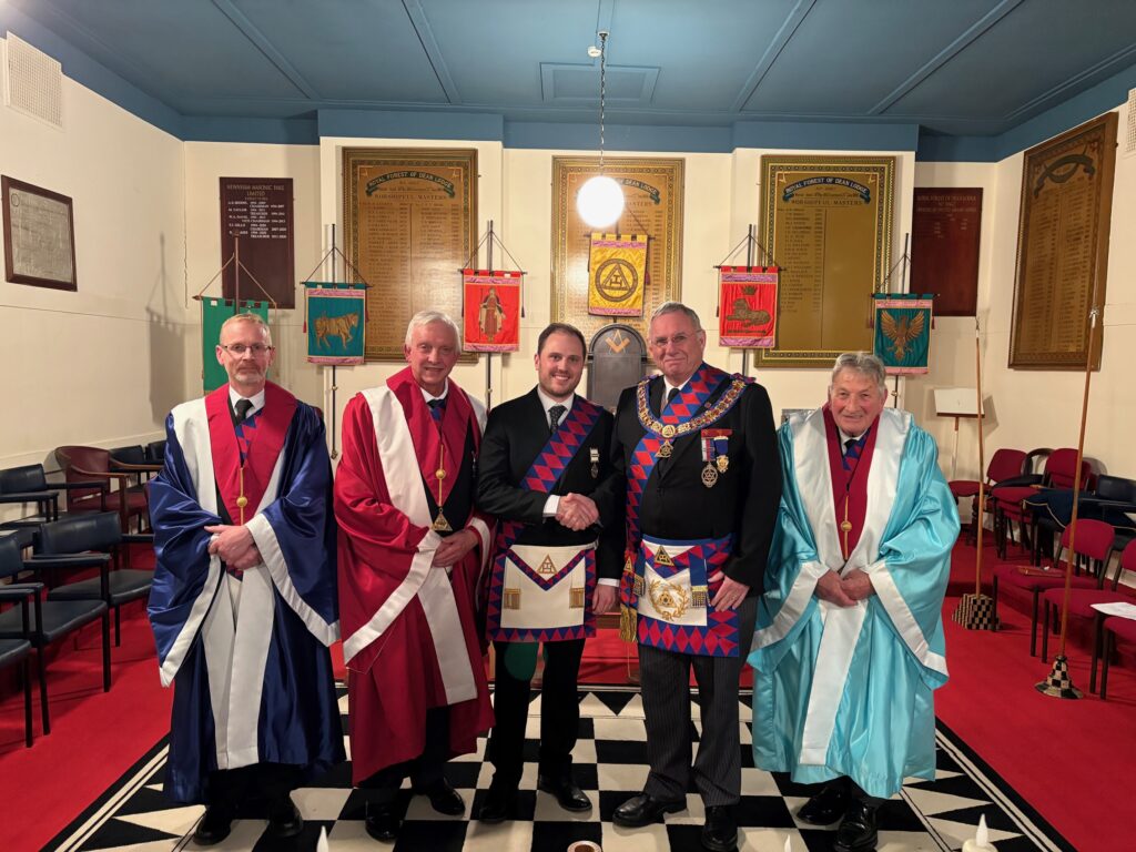 a number of companions with the most recent exaltee being welcomed by the grand superintendent.