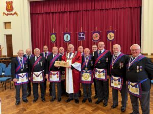 the most excellent grand superintendent presenting the travelling sceptre to the members of Vassar Smith Chapter
